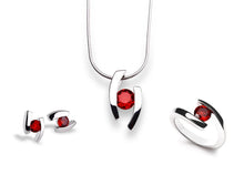 Load image into Gallery viewer, Blue Topaz and Garnet jewelry set in sterling silver by Joryel Vera - view 3
