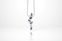 Load image into Gallery viewer, Garnet and London Blue Topaz pendant in sterling silver by Joryel Vera, style P3844
