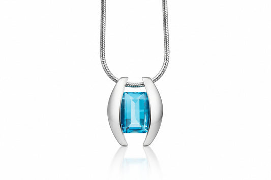 Blue Topaz and Garnet pendant in sterling silver by Joryel Vera, style P4747