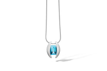 Load image into Gallery viewer, Blue Topaz and Garnet pendant in sterling silver by Joryel Vera, style P4747