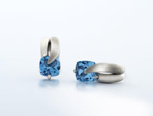 Load image into Gallery viewer, Blue Topaz and Garnet earrings in sterling silver by Joryel Vera, style E7360 - view 4