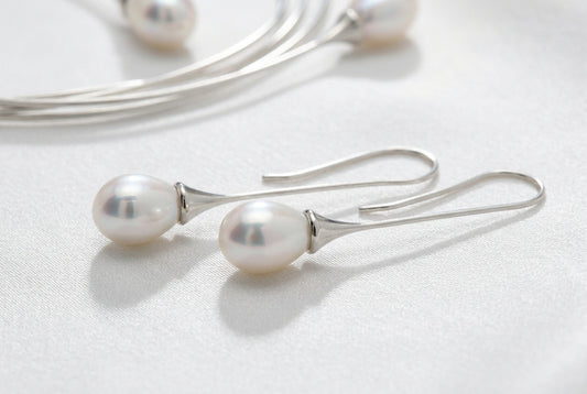 Pearl earrings in sterling silver by Joryel Vera, style E6839