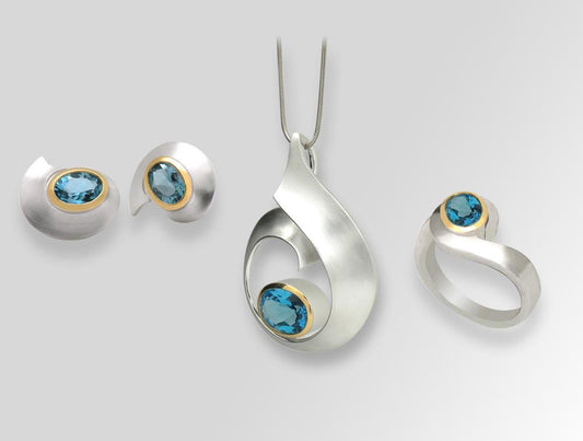 Blue Topaz and Garnet jewelry set in sterling silver by Joryel Vera