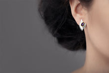 Load image into Gallery viewer, Blue Topaz and London Blue Topaz earrings in sterling silver by Joryel Vera, style E9328 - view 3
