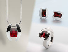 Load image into Gallery viewer, Blue Topaz and Garnet jewelry set in sterling silver by Joryel Vera - view 2